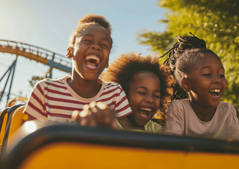 Kids Riding Roller Coaster