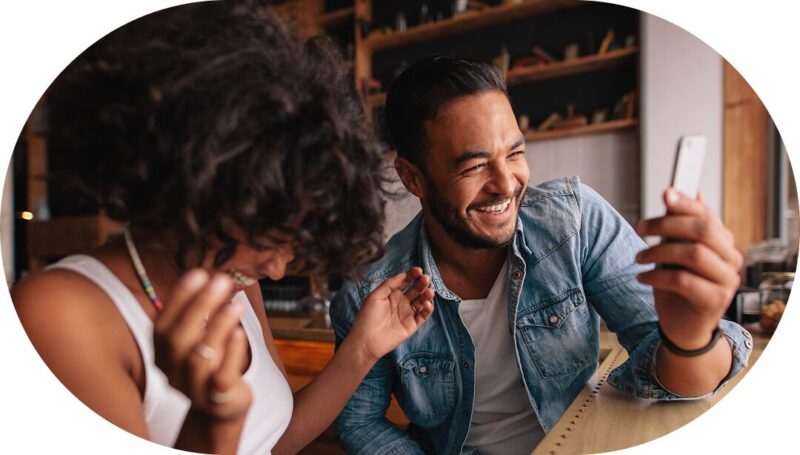 Two people laughing