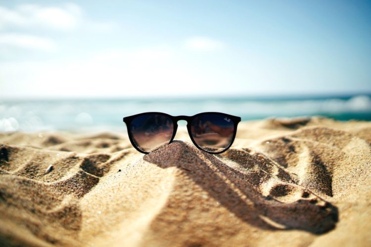 Sunglasses on Summer Sand